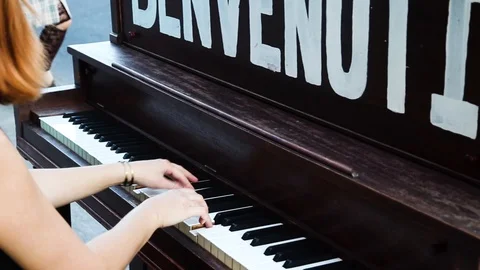 2 pianists playing energetically on public piano, music duo Stock Footage 87346713