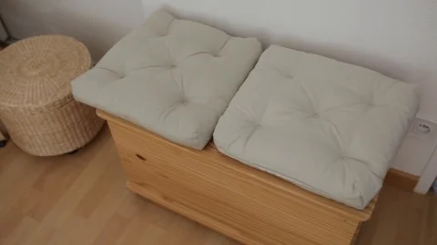 2 Pillows on Wooden Crate Stock Footage 99307580