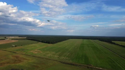 An-2 plane is landing, shooting from a drone Stock Footage 220711267
