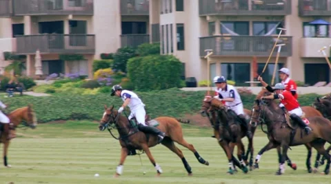 2 POLO RIDERS TAKE CORNER Stock Footage 7135135