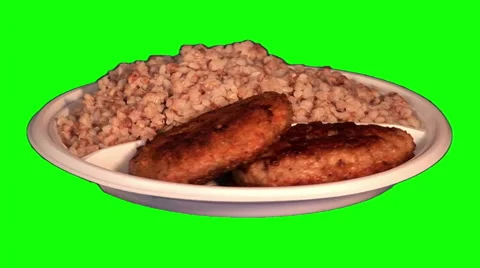 2 pork chops, buckwheat on throwaway plate Video stock 47557636