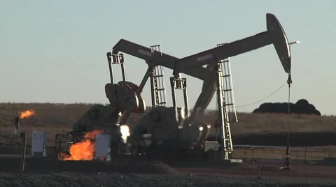 2 Pumping Units With 2 Gas Flares Stock-Footage 43048163