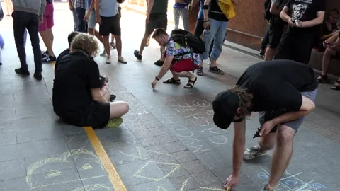 2 pupils, lyceum, student draw, depict, draw drawings, graphics with  crayons. Stock Footage 134259529