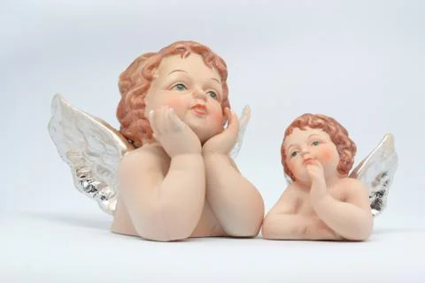 2 Putti isolated on a white background Stock-Fotos