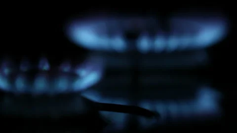 2 shifting blue gas flame of gas stove on black background. 4K Stock Footage 220637670