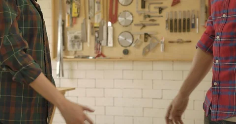 2 Shot of Hand shake woodworker dealer young man and woman carpenter Видео 126199027