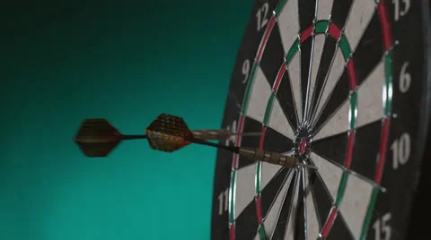 2 shots of darts hitting board in slow motion; shot on Phantom Flex 4K at 1000 Stock Footage 55660282