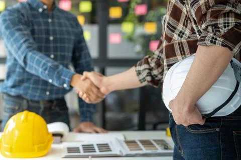 2 smart engineer discussion before work Stock Photos