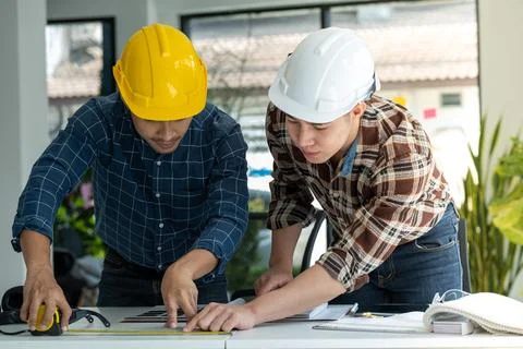2 smart engineer discussion before work Stock Photos
