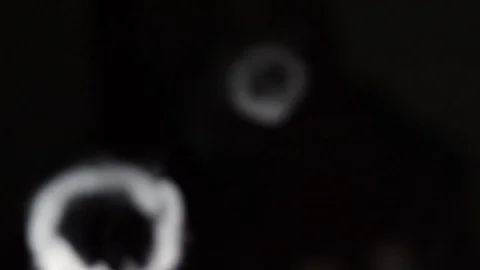 2 smoke vape vortex rings moving towards screen, slow motion Stock Footage 115769677