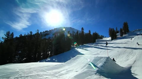 2 SNOWBOARDERS JUMP Stock Footage 1012917