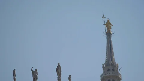 2 Statues And Virgin Mary On Duomo Cathedral Milan Italy Stock Footage 128752933