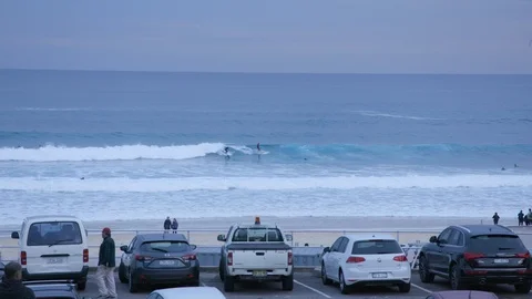 2 surfers riding the same wave Video stock 106591363