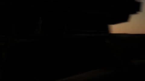 2 tanks drive through a wheat field at sunset.  Stock Footage 209827042