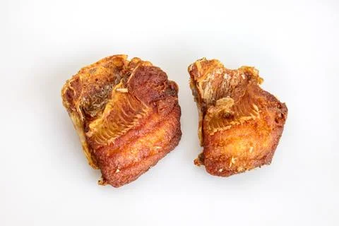 2 of tilapia fish fried, crispy on white background - top view, closeup 스톡 사진