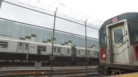 # 2 Train Arriving At Station Stock Footage 104841715