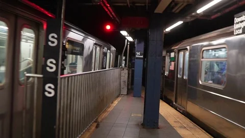 2 trains side by side leaving Stock Footage 240353279
