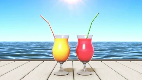 2 tropical drinks at a seashore Stock Footage 103363008