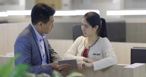 2 white collar worker having discussion on the business planning checklist Stock Footage 195095210