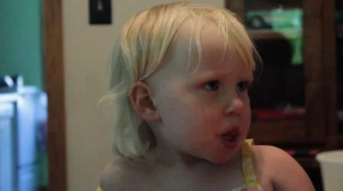 2 year old looks down sadly Video stock 40029229
