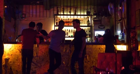 2 young men talking at the bar Stock Footage 90517816