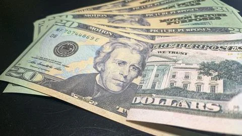 20 dollars on a black background. Foto stock