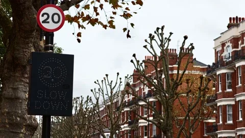 20 MPH Sign - Digital Slow Down Sign - UK Video stock 142942893