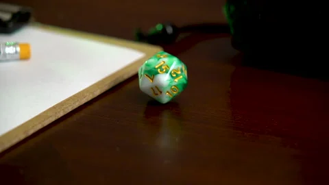 20 sided dice dropping on table Stock Footage 201496365