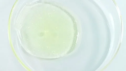200 cosmetic fluid in cup Stock Footage 317609176