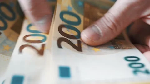 200 Euro bills counted by hands Stock Footage 235478232
