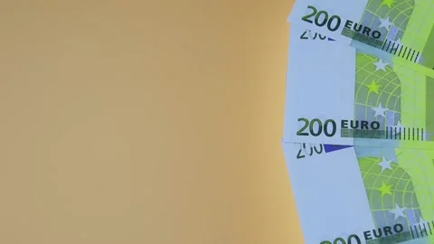 200 euro bills rotating on the table. Rotation of money. Top view, Copy space. Vidéo 141314739