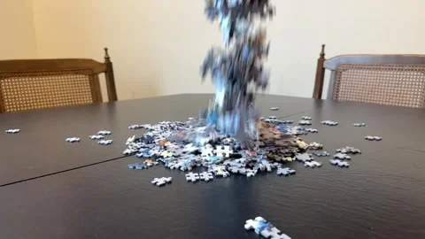 2000 Puzzle Pieces Falling in SloMo Stock Footage 302846683
