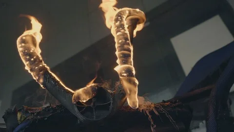 200fps slow motion of flame/ fired chair close up melting down Stockbeeldmateriaal 109351376