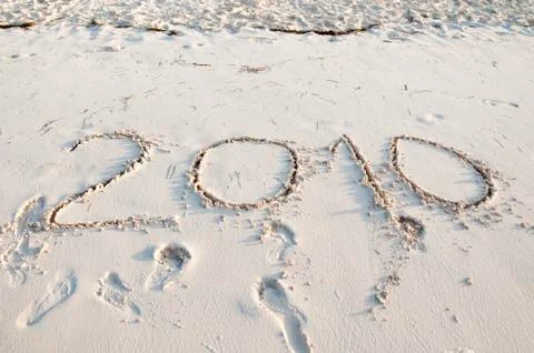2010 written in beach sand Stock Photos