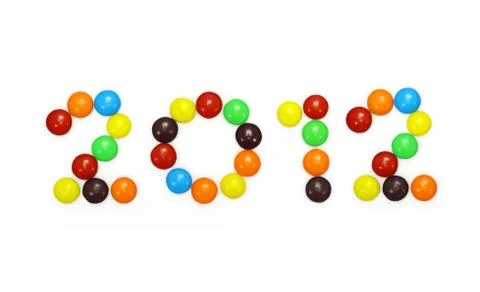 2012 made of candy coated chocolate isolated on white Stock Photos