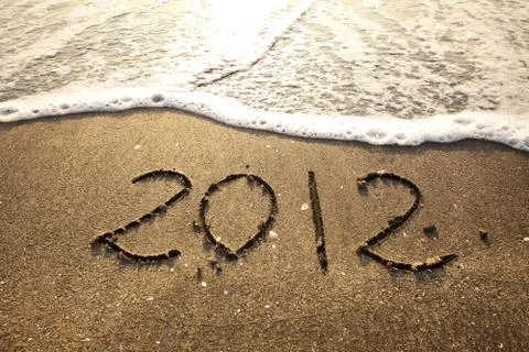 2012 written on sand Stock Photos