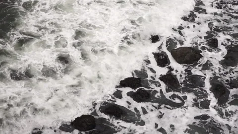 20130103102418 Waves Rolling Over Rocks Stock Footage 217746002