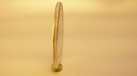 2014:.Coin On Table Spinning In Circle Stock Photos