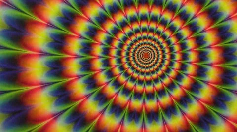 2014:.Rainbow Colored Pattern Twirls On Screen Pattern Gets Smaller Closer To Stock Photos