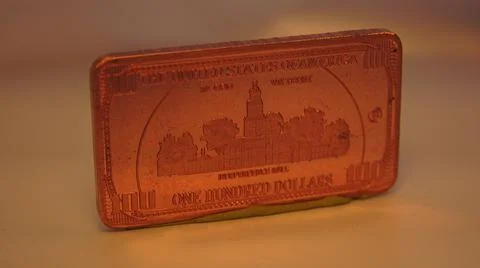 2014:.Rectangular On Hundred Dollar Coin Rotating In Clockwise Motion 스톡 사진