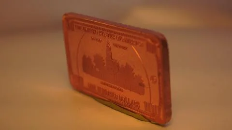 2014:.Rectangular On Hundred Dollar Coin Rotating In Clockwise Motion Stock Photos