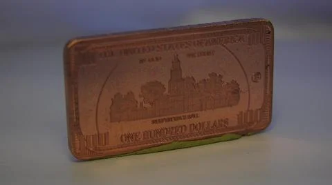 2014:.Rolling Vintage Golden Brown Rectangular On Hundred Dollar Coin 写真素材