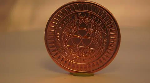 2014:.Rotating Copper Colored Coin 库存照片