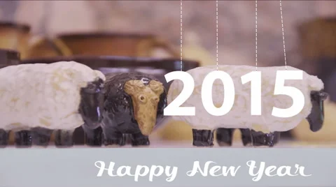 2015 New year. Ceramic sheep statuettes. Stock Footage 45440717