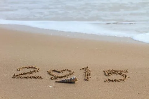 2015 write on sand beach Stock Photos
