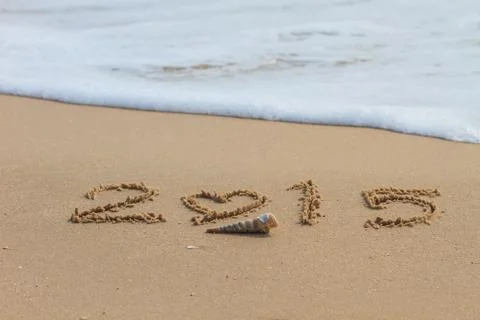 2015 write on sand beach Stock Photos
