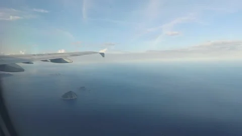 2016 August, flying above Cam Ranh bay, Vietnam, view through an airplane win Stock Footage 130903352