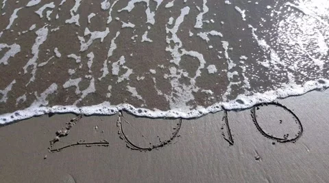2016 written on sand that is erased by the waves Stock Footage 68859493