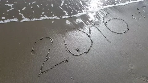 2016 written on sand that is erased by the waves Stock Footage 68864114