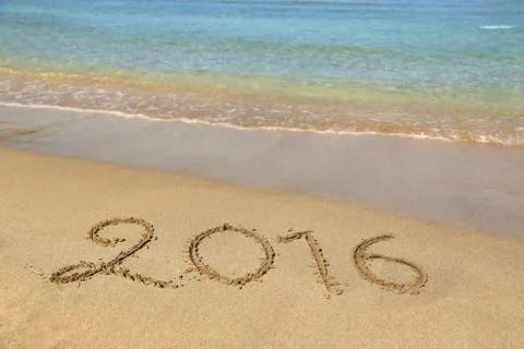2016 written on sandy beach Stock Photos